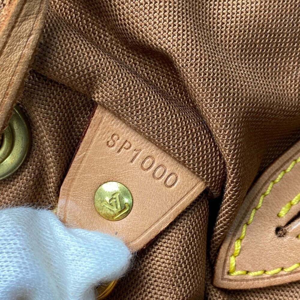 LOUIS VUITTON Authentic Brown Monogram Backpack - Picture 12 of 16